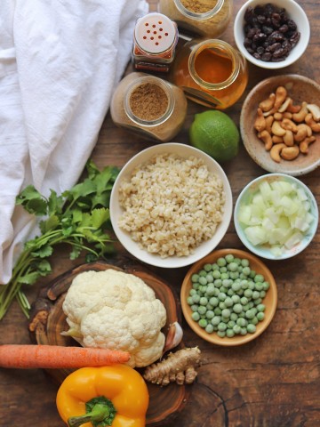 Ingredients for turmeric rice on table.