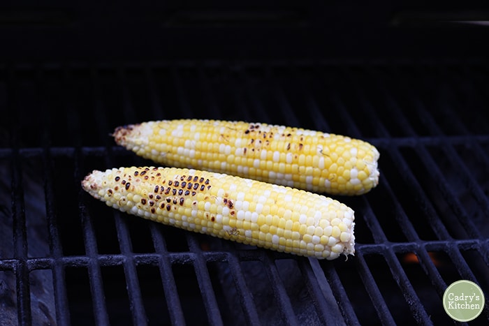 Grilled corn on the cob on outdoor grill