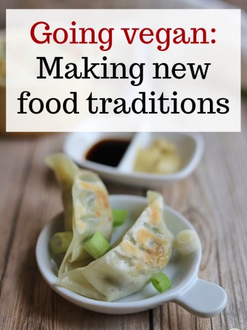 Text overlay: Going vegan: Making new food traditions. Potstickers on plate with dipping sauces.