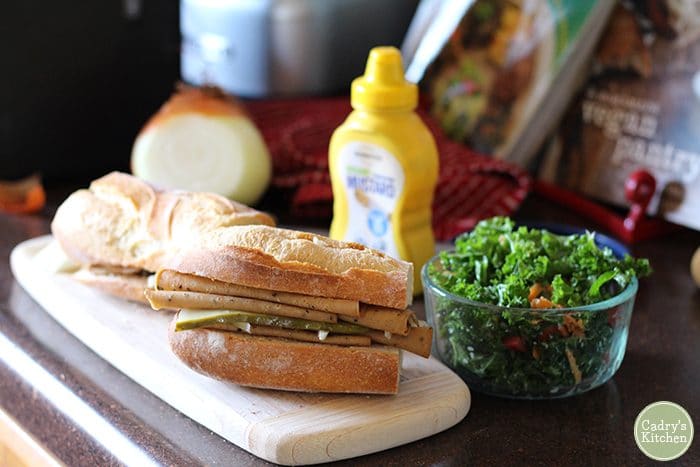 Vegan sandwich with mustard and salad.