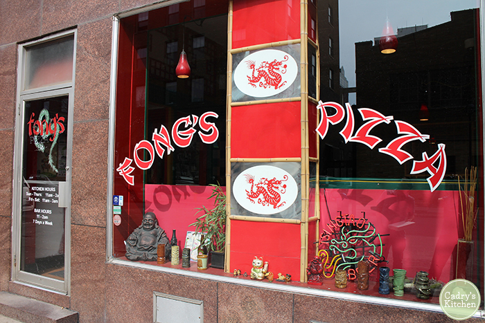 Exterior Fong's Pizza window in Des Moines, Iowa.