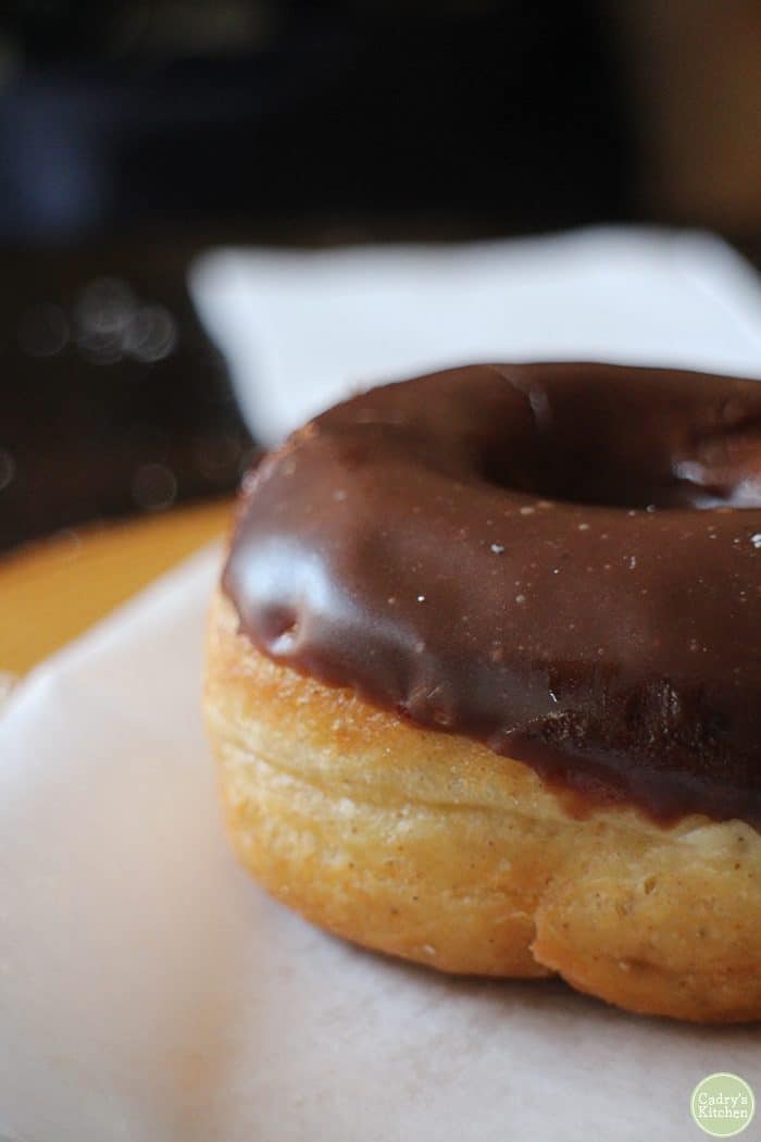 Close up chocolate covered doughnut.