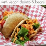 Text overlay: Fried puffy tacos with vegan chorizo and beans. Two tacos in basket.