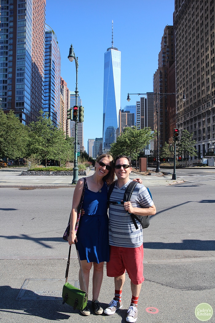 Cadry and David in front of One World Trade Center in New York City, New York.
