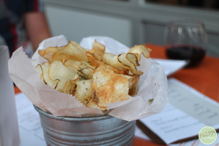 Potato chips in metal bucket.