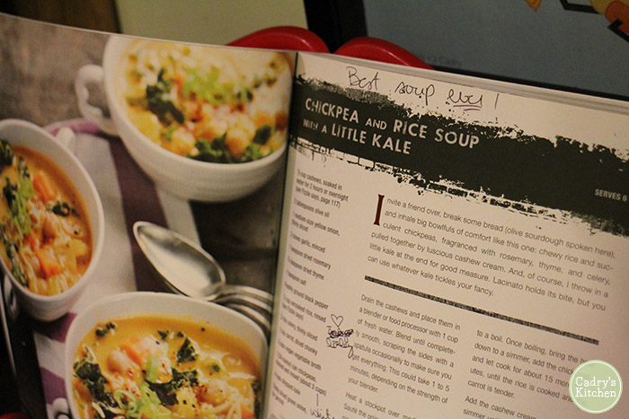 Cookbook open to chickpea and rice soup recipe.
