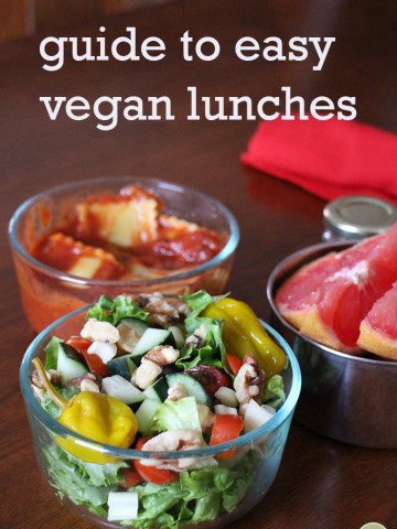Text overlay: Guide to easy vegan lunches. Salad, ravioli, and grapefruit in glass dishes.