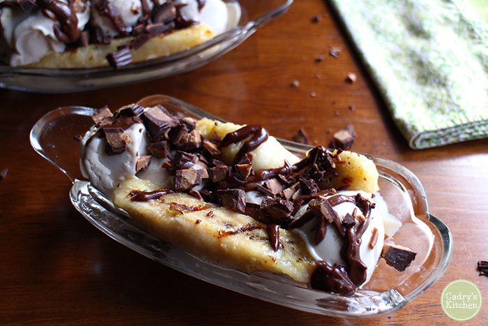 Peanut butter chocolate sauce over grilled bananas and ice cream.