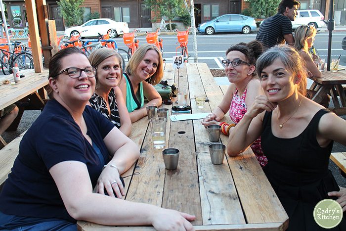 Kristina Sloggett, Kristy Turner, Cadry Nelson, Kittee Berns, and Julie Hasson at picnic table.