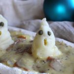 Mashed potato ghost with capers for eyes.