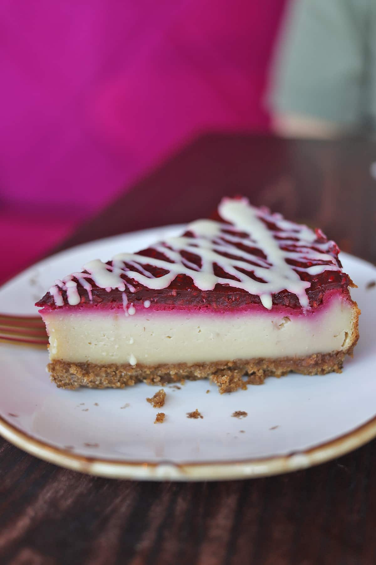 White chocolate and raspberry cheesecake slice.
