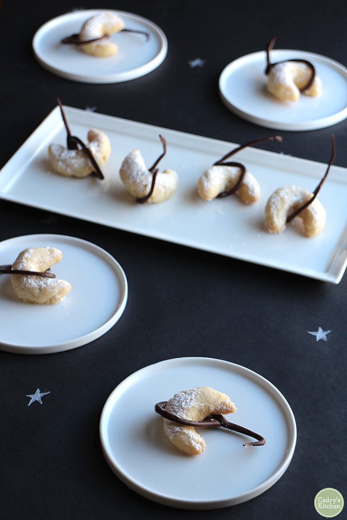 Moon cookies on plates.