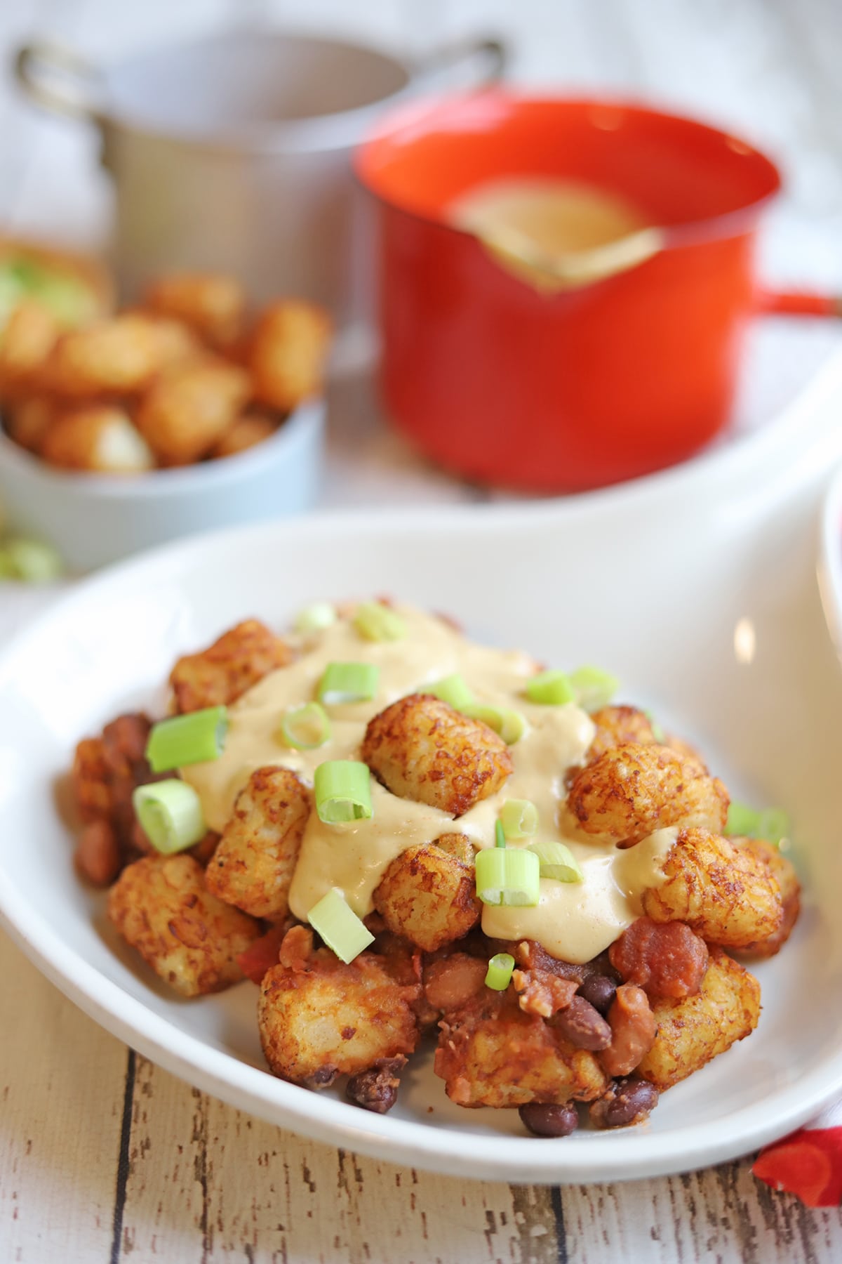 Chili cheese tots on platter.