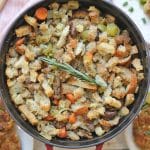 Text overlay: Vegan stuffing with chestnuts. Dutch oven filled with stuffing.