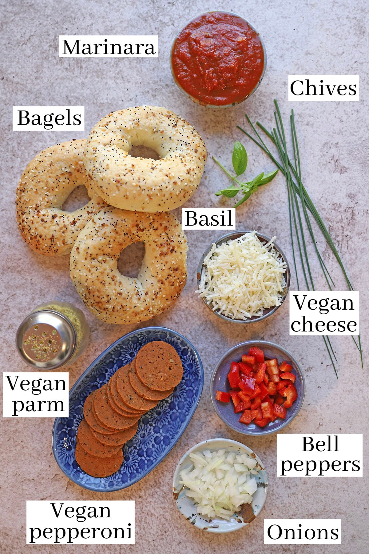 Labeled ingredients for vegan pizza bagels.