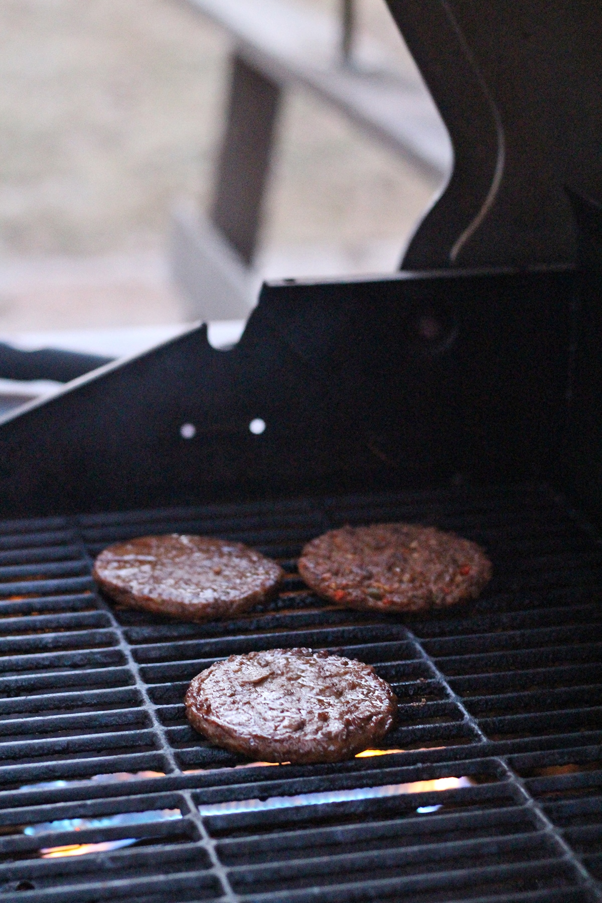 Gardein burgers on outdoor grill.