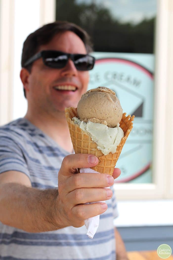 David holding waffle cone from Crepe & Spoon with pistachio & coffee non-dairy ice cream.