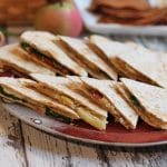 Vegan quesadillas with apples, caramelized onions, and spinach.