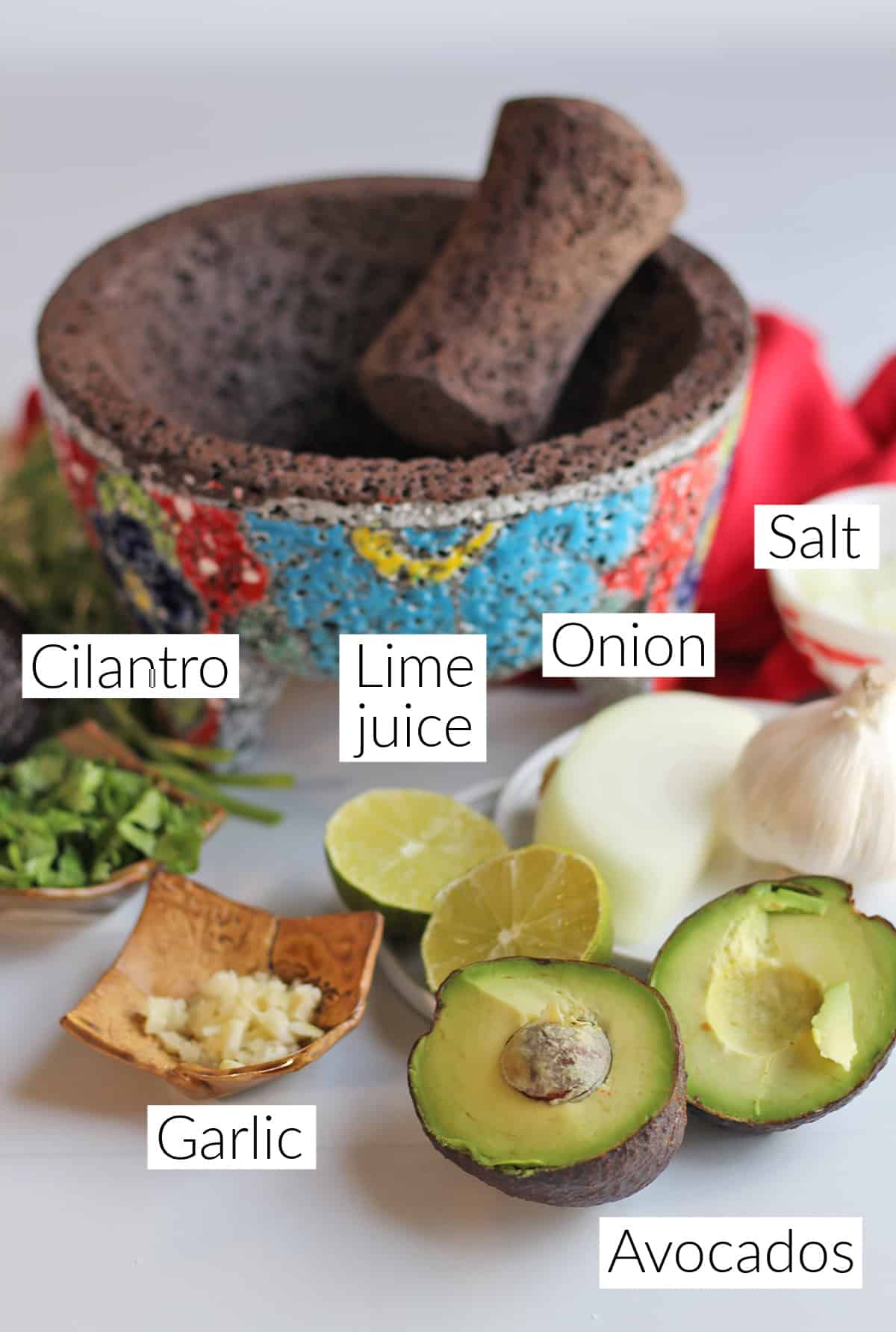 Labeled ingredients for vegan guacamole.