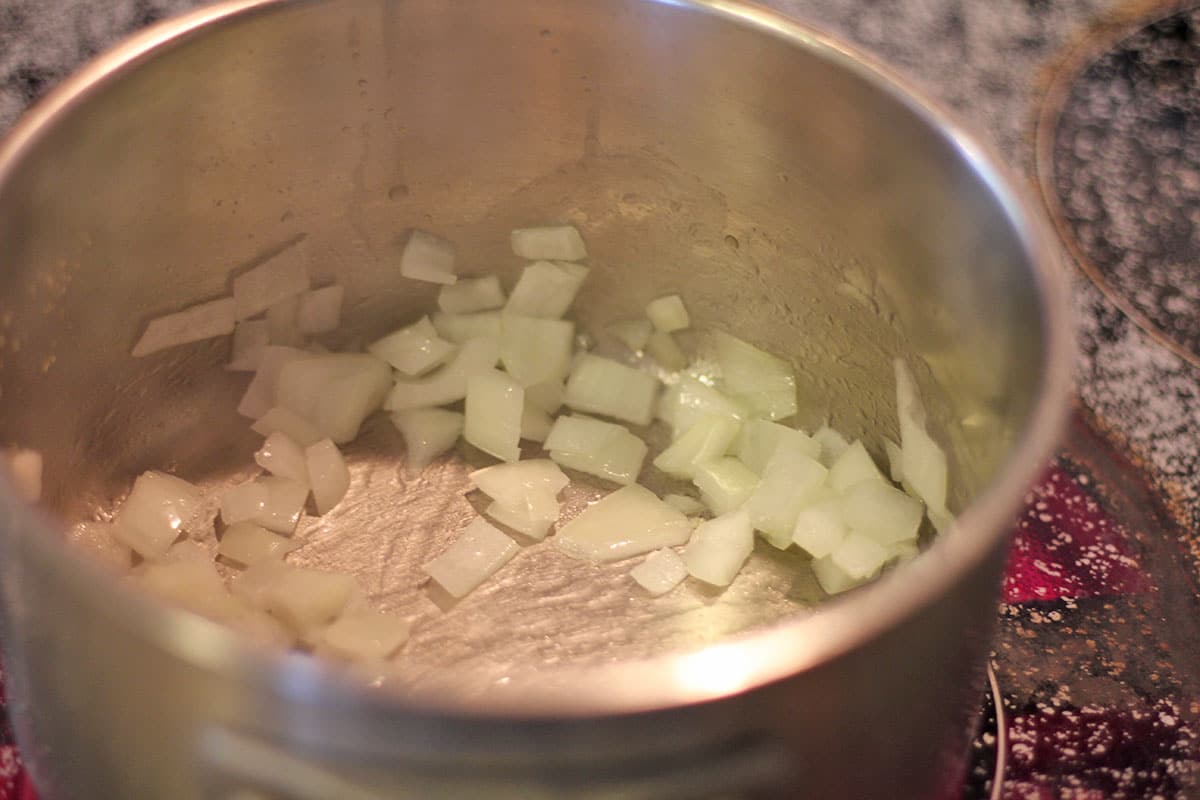 Onions sauteing in pot.