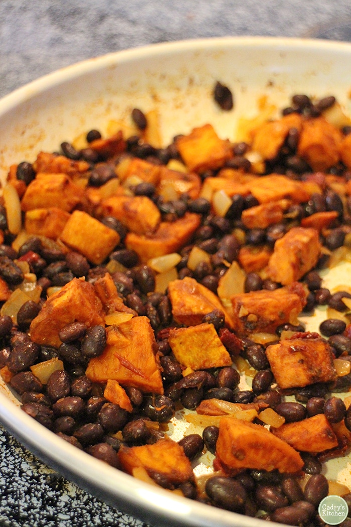 Sweet potato and black bean mixture in skillet.