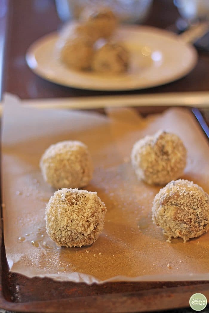 Italian rice balls on parchment paper.