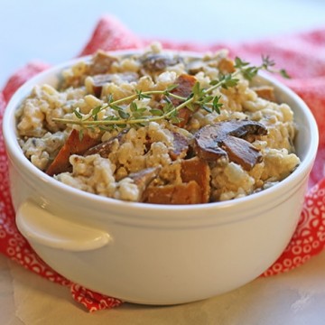 Vegan risotto with mushrooms and seitan sausage.