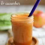 Text: Carrot juice recipe with apple, celery, and cucumber. Glass of juice with bright blue straw.