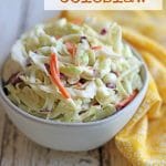 Text: Easy vegan coleslaw. Bowl of vegan coleslaw on white table with yellow napkin.