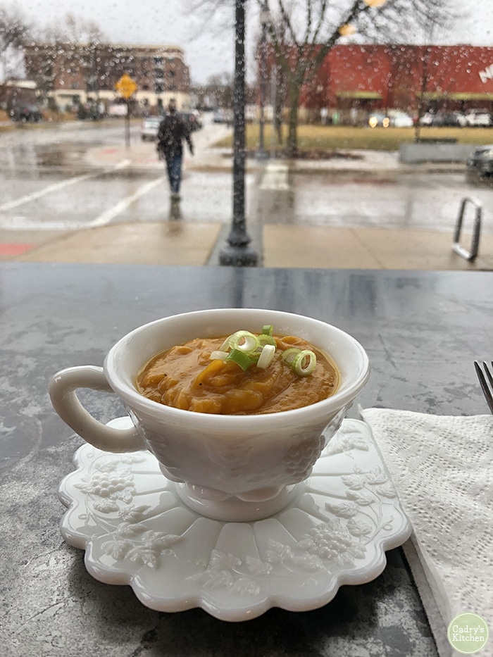 Butternut squash soup in cup at Rawlicious.