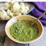Text overlay: Cilantro chimichurri. Vegan and gluten-free. Bowl of sauce on table.