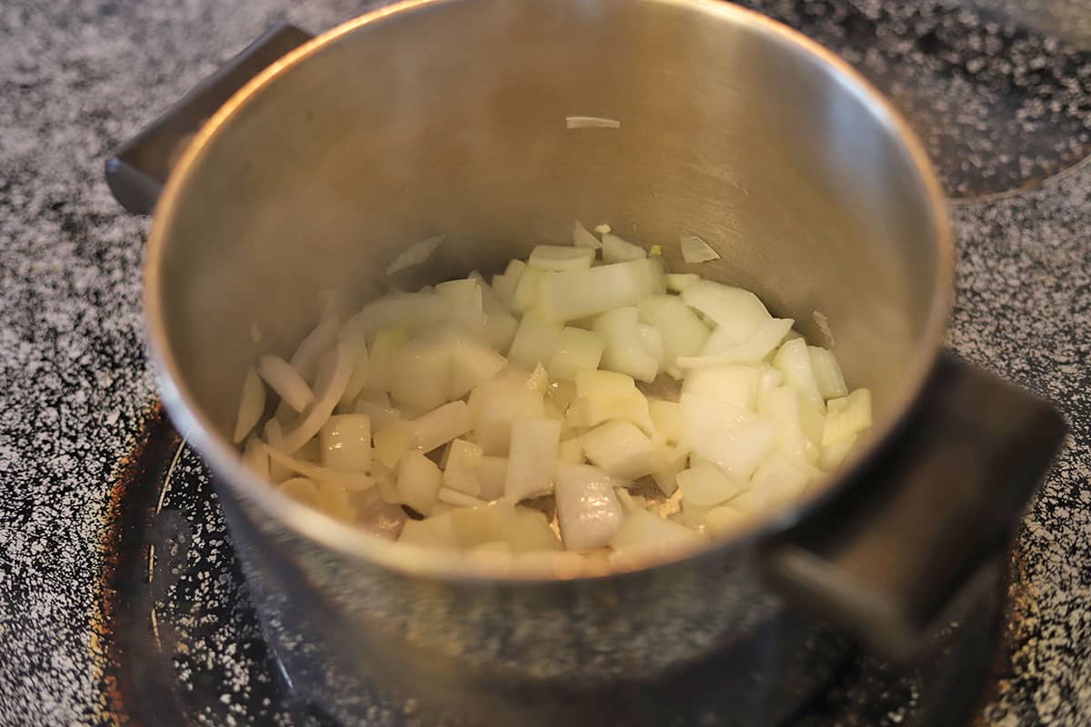 Onions sauteing in pot.