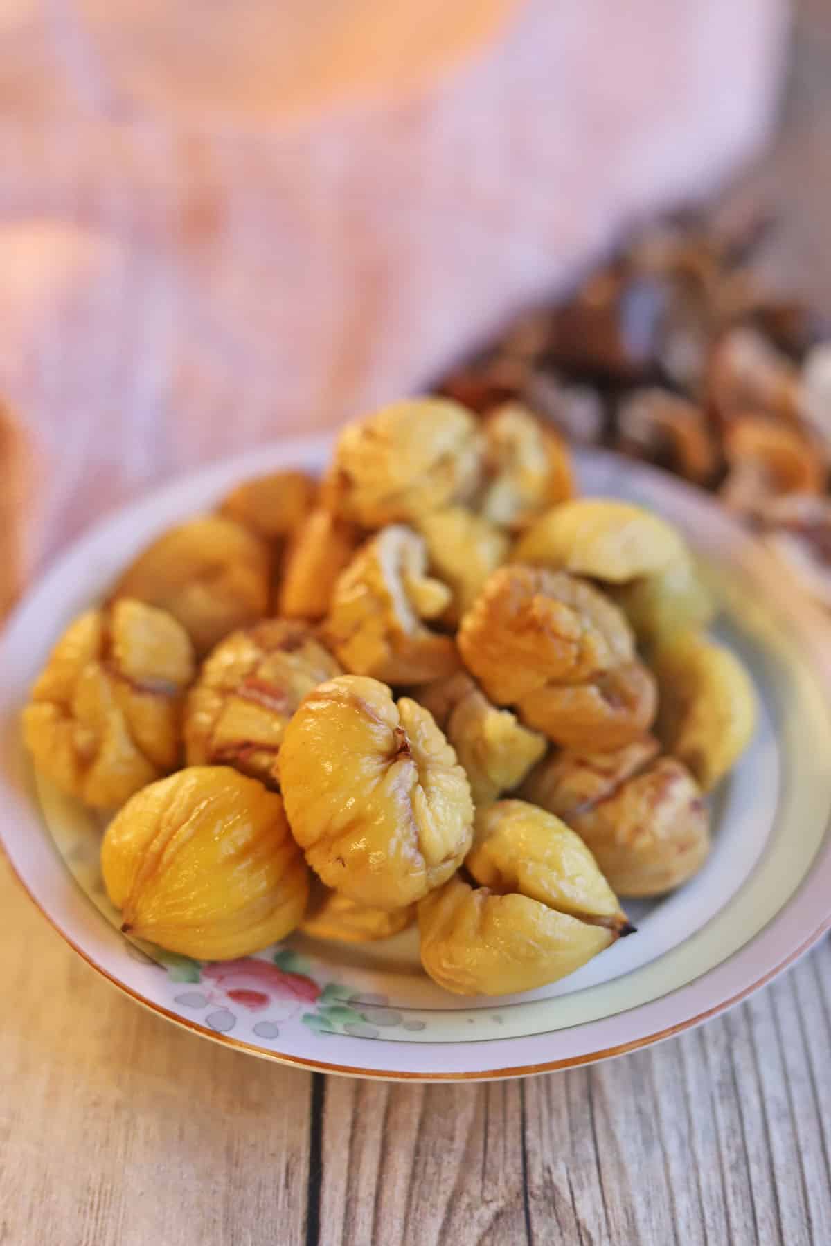 Peeled chestnuts on a plate.
