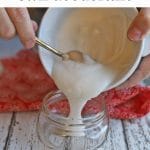 Text overlay: How to make your own deodorant. Coconut oil mixture being poured into small jar.