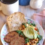Maple mustard sausage slices on plate with tofu scramble and toast.