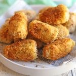 Pile of fried artichoke hearts on platter.