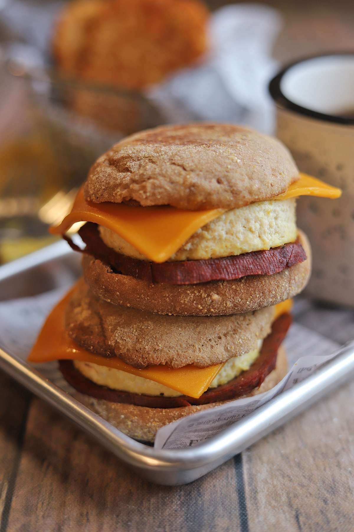 Two vegan egg mcmuffins stacked on each other.