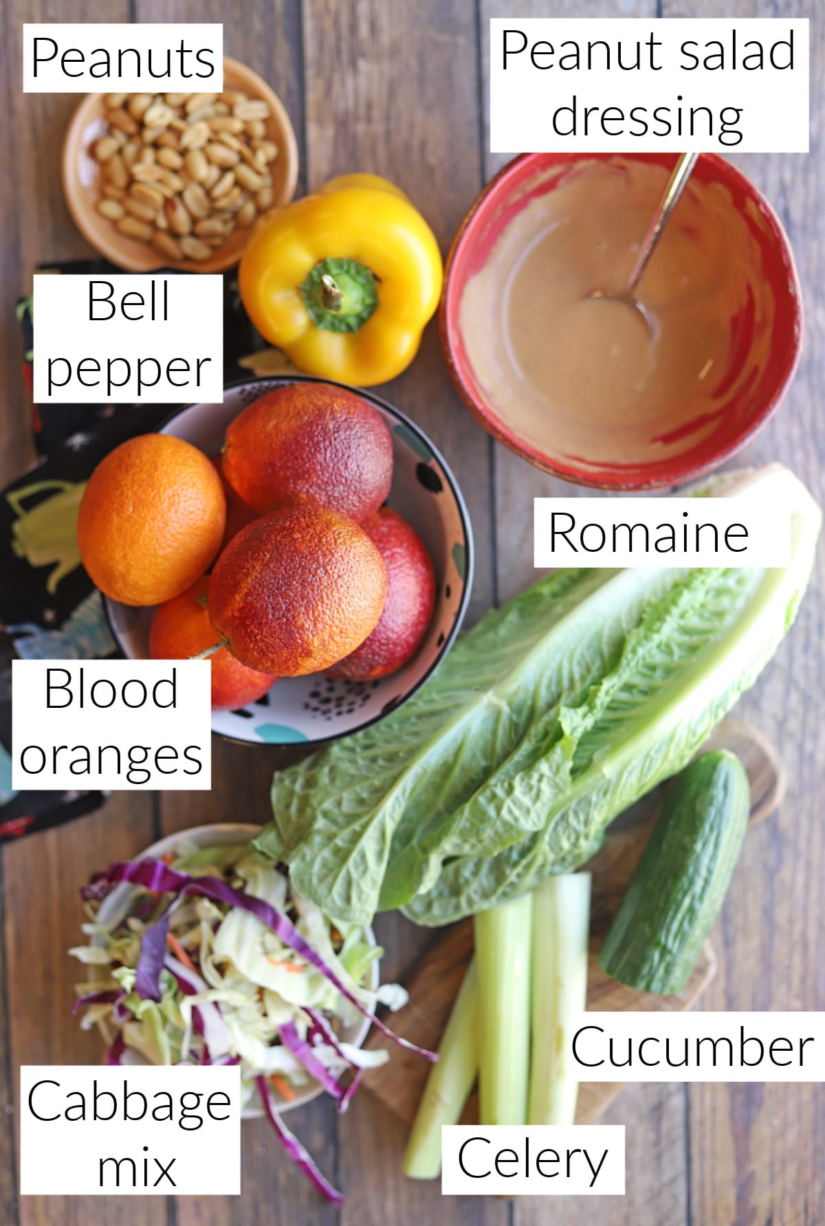 Labeled ingredients for salad with blood oranges & peanut dressing.