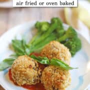 Text overlay: Vegan arancini, air fried or oven baked. Arancini balls on plate with basil and broccoli.