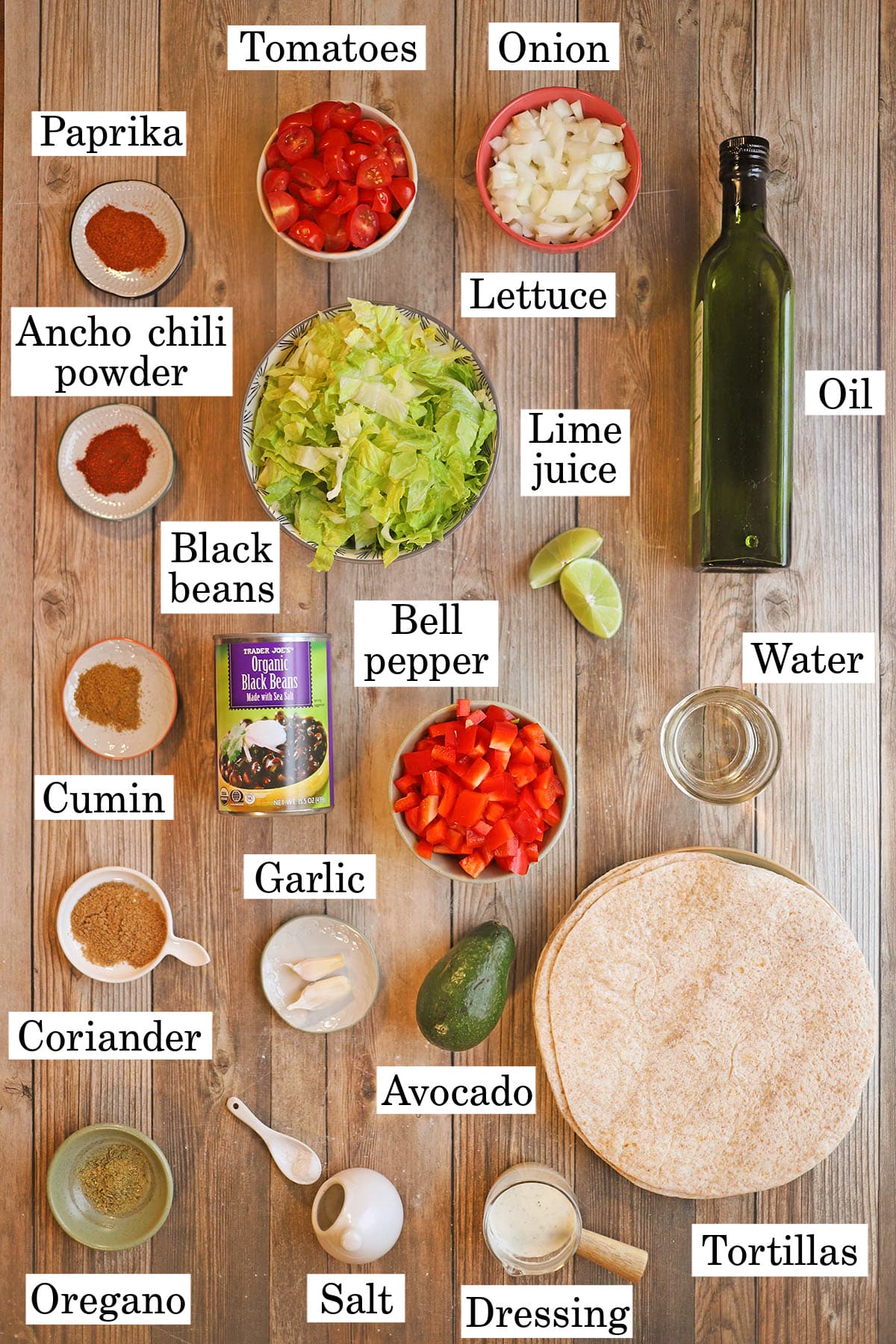 Labeled ingredients for black bean taco salads.