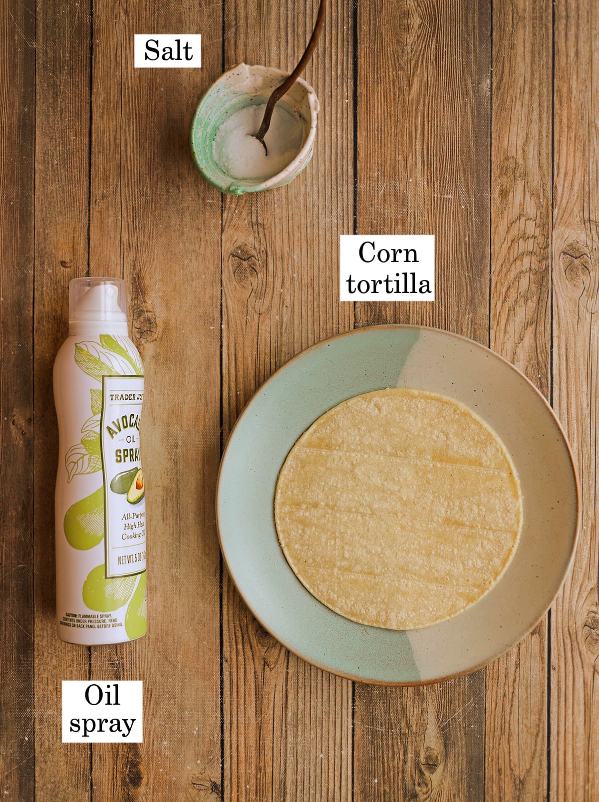 Labeled ingredients for air fryer tortilla strips - oil spray, salt, and a corn tortilla.