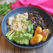 Black beans and rice bowl with guacamole and fried sweet plantains.