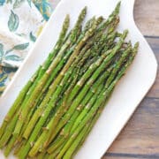 Crispy air fried asparagus on platter.