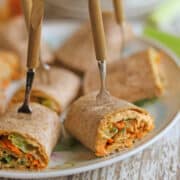 Buffalo hummus tortilla pinwheels on platter.