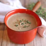 Dairy-free chestnut gravy in orange gravy boat.