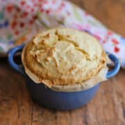 Baked vegan feta cheese in blue cocotte.