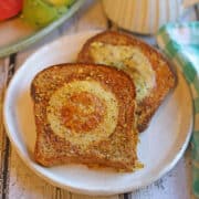 Two slices of vegan egg in a hole on plate.