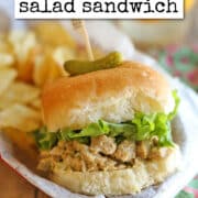 Text overlay: cadryskitchen.com, vegan chicken salad sandwich. Seitan chicken salad sandwich in basket with potato chips.