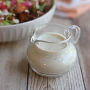 Dill and garlic dairy-free dressing in pitcher.