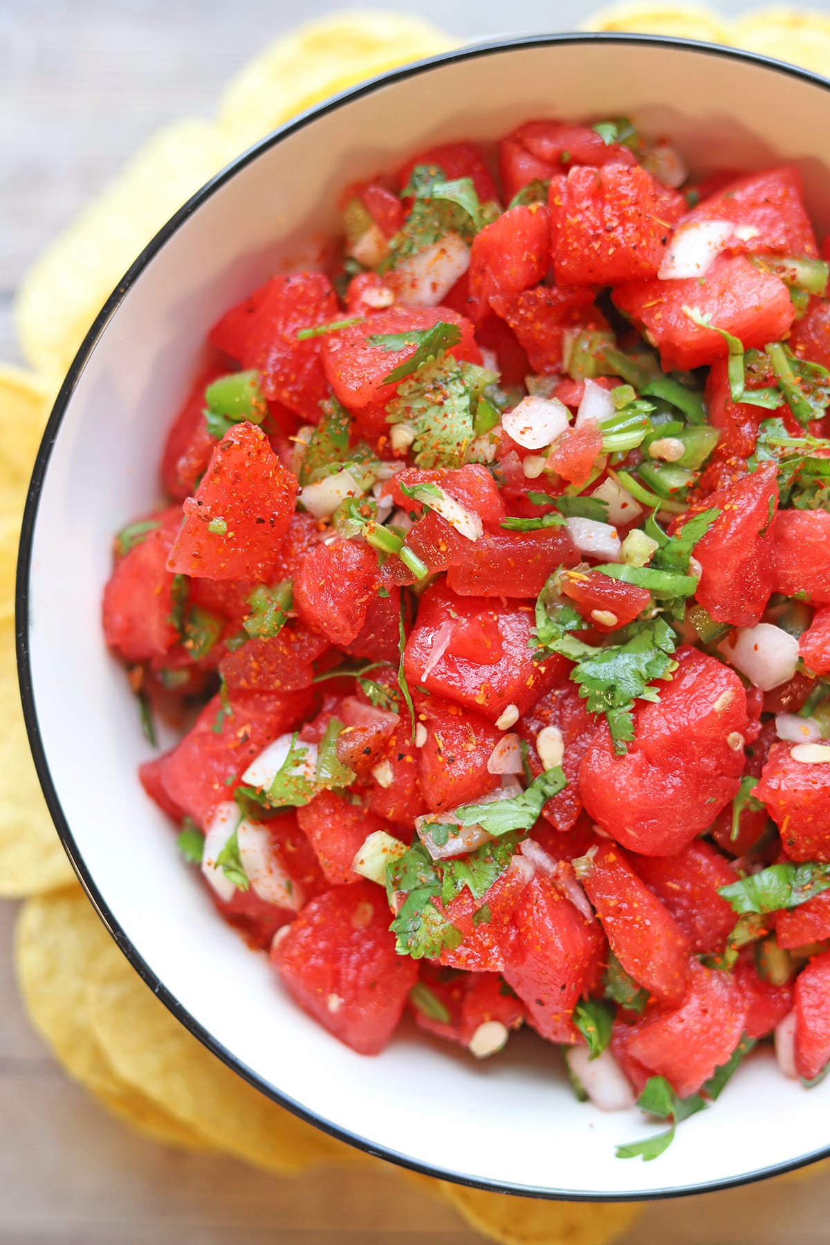 Watermelon salsa dip with cilantro and onion.